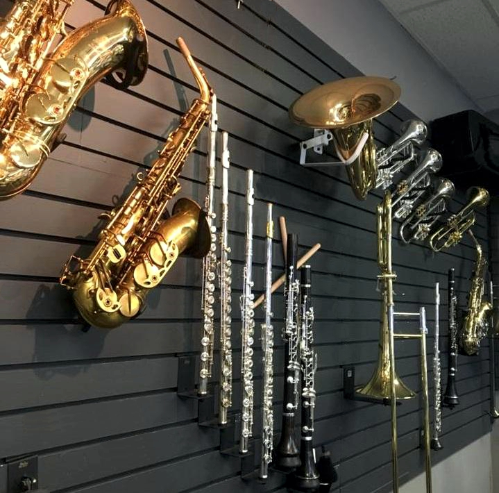 Brass and woodwind instruments on display